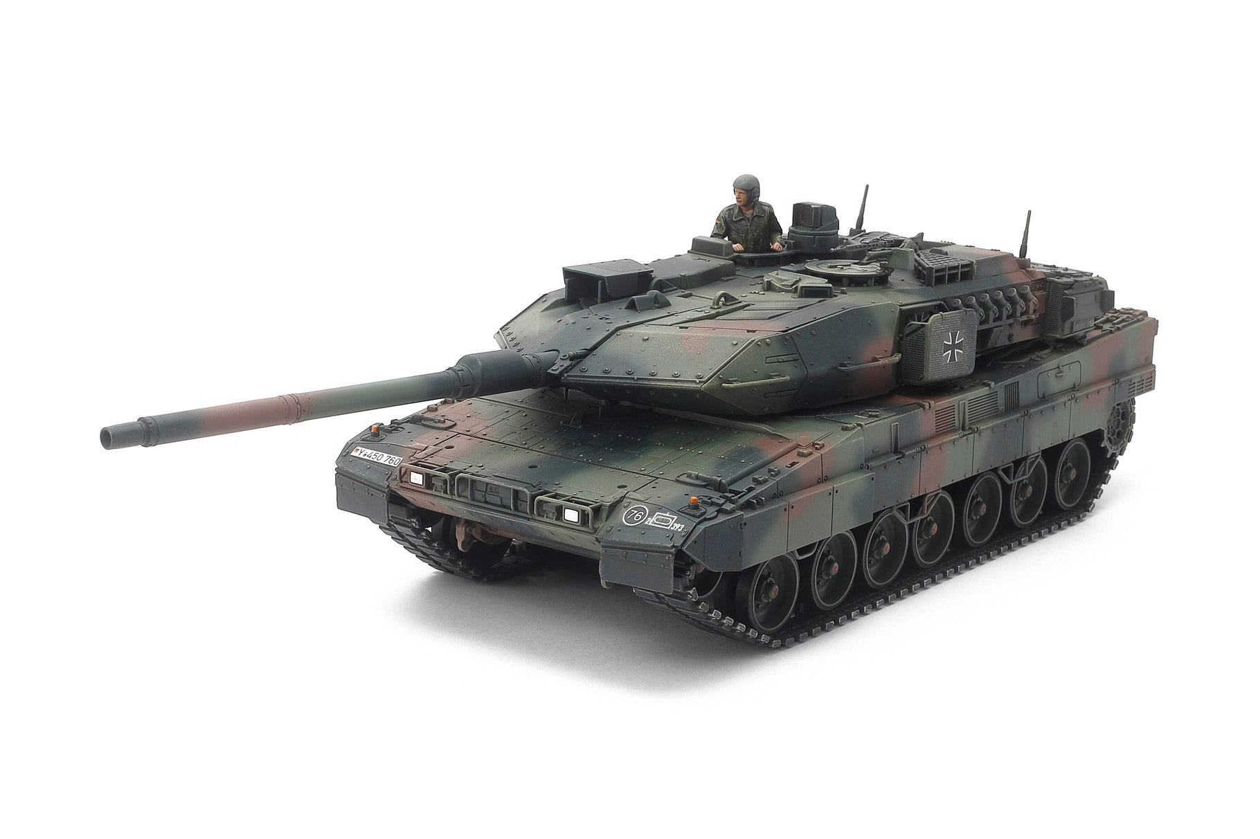 1/48 scale model kits of a detailed military tank with a soldier figure, showcasing expert craftsmanship and accuracy.