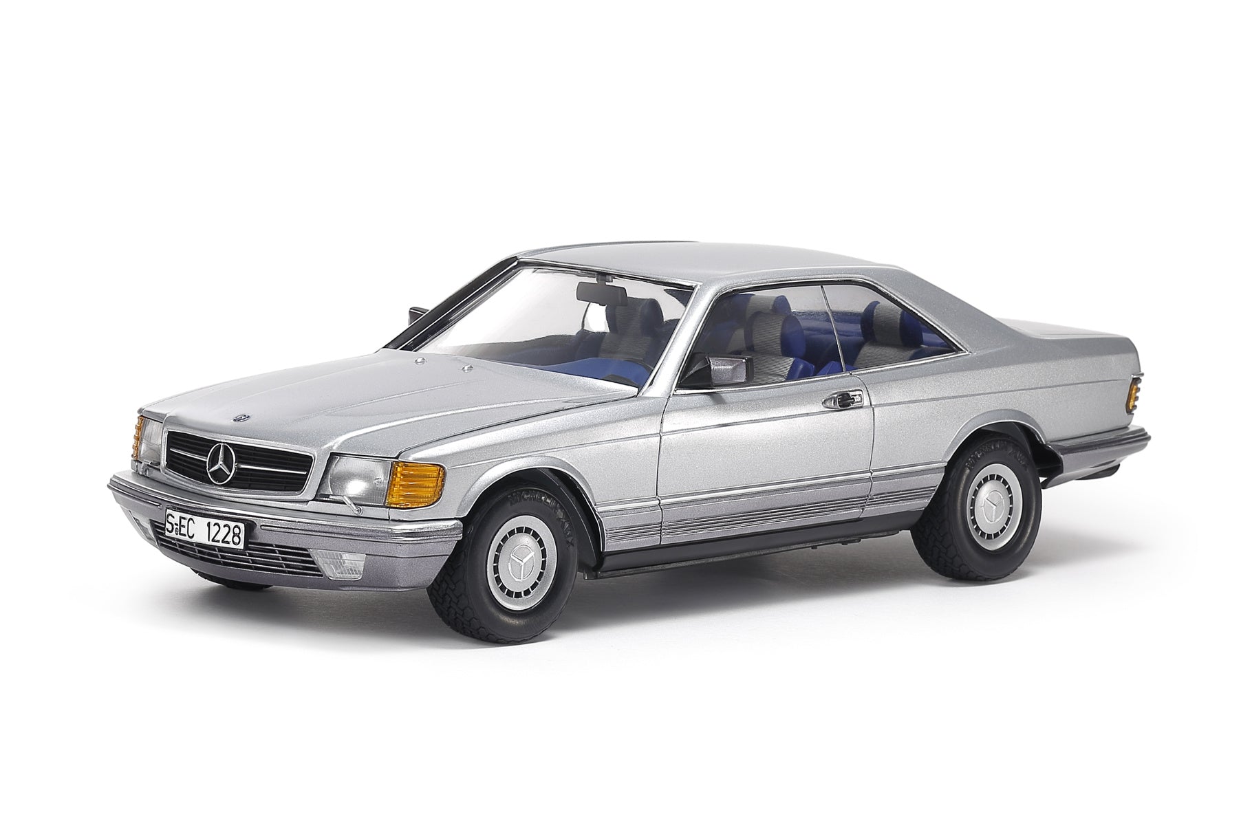 Model of a classic Mercedes-Benz car on a white background