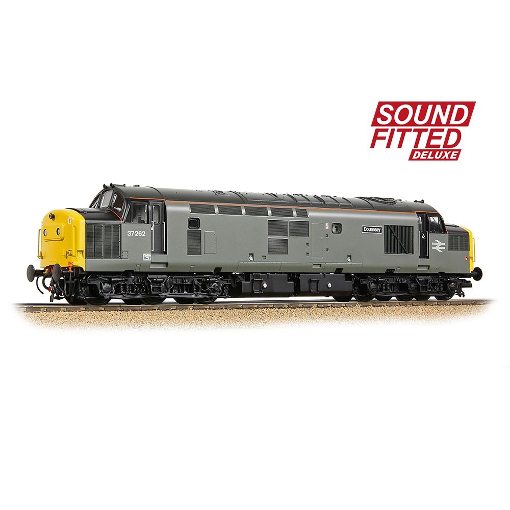 Model train with 'Sound Fitted Deluxe' label on a white background