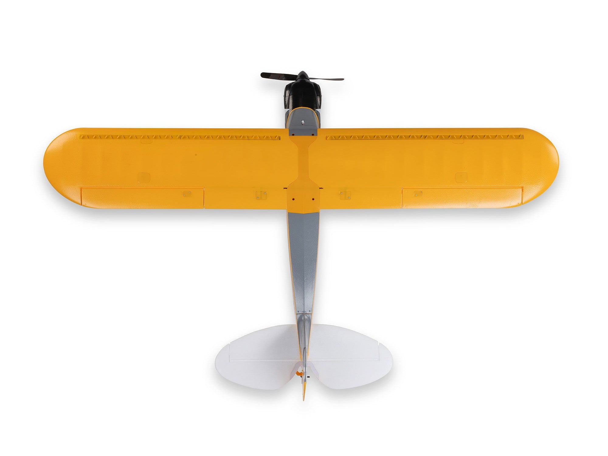 Carbon Cub S 2 Cleetus McFarland RC airplane top view showing yellow wings and sleek design.