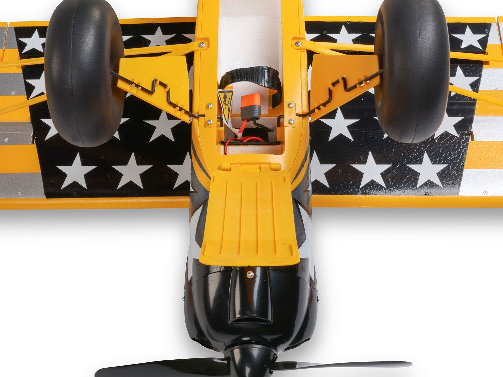 Top view of the Carbon Cub S 2 Cleetus McFarland RC airplane showcasing its star-patterned wings and detailed design.