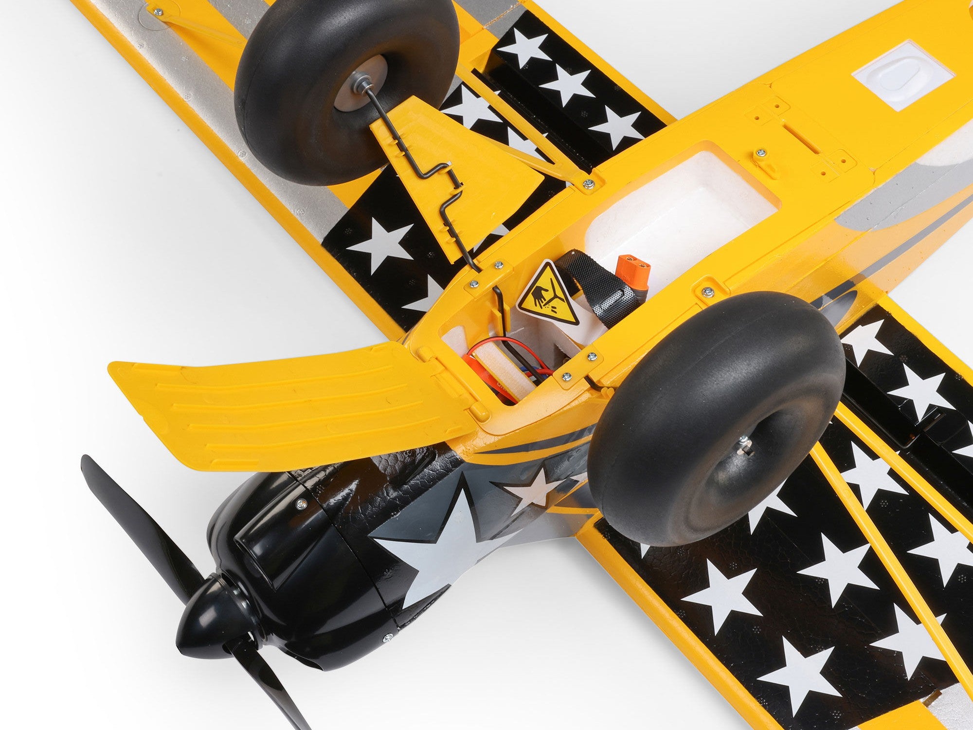 Carbon Cub S 2 Cleetus McFarland RC airplane top view showcasing the yellow and black design.