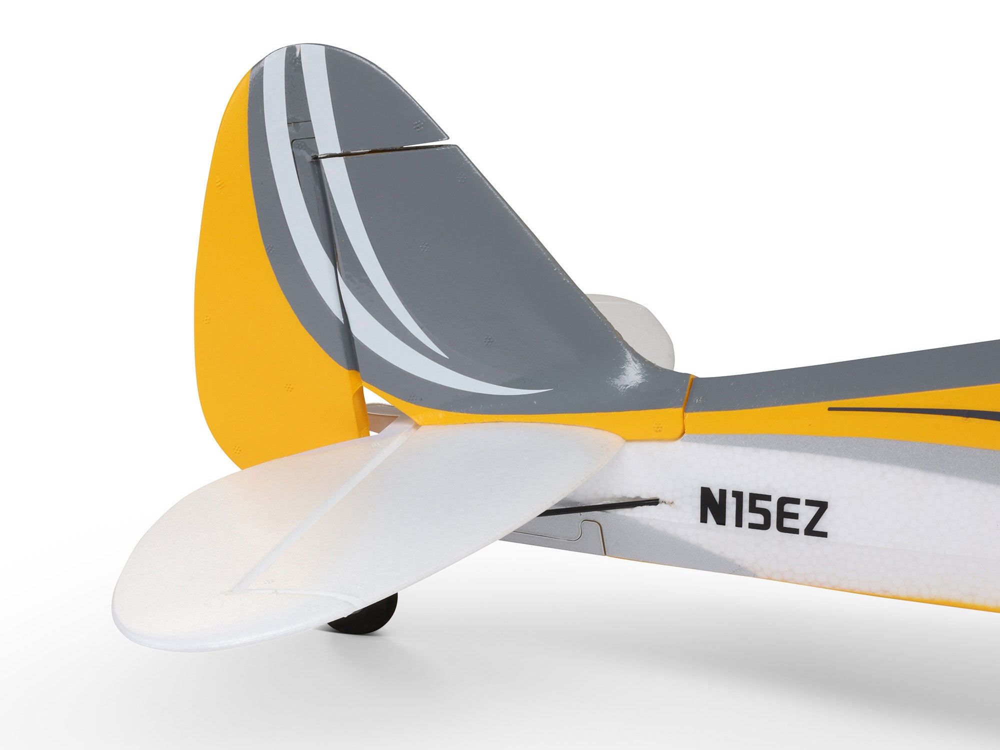Carbon Cub S 2 Cleetus McFarland RC airplane tail detail with yellow and grey design.