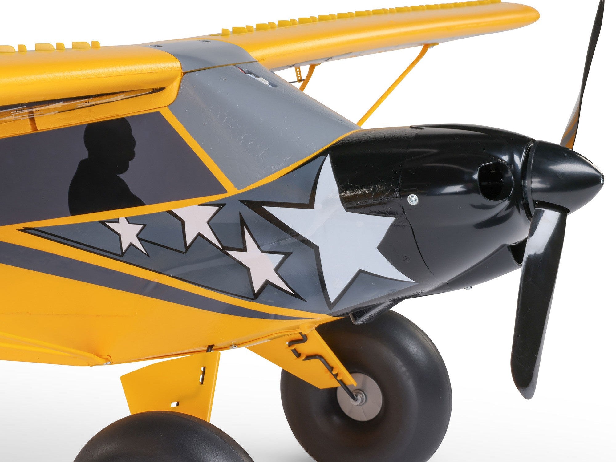 Carbon Cub S 2 Cleetus McFarland RC airplane close-up showing detailed star design on fuselage.