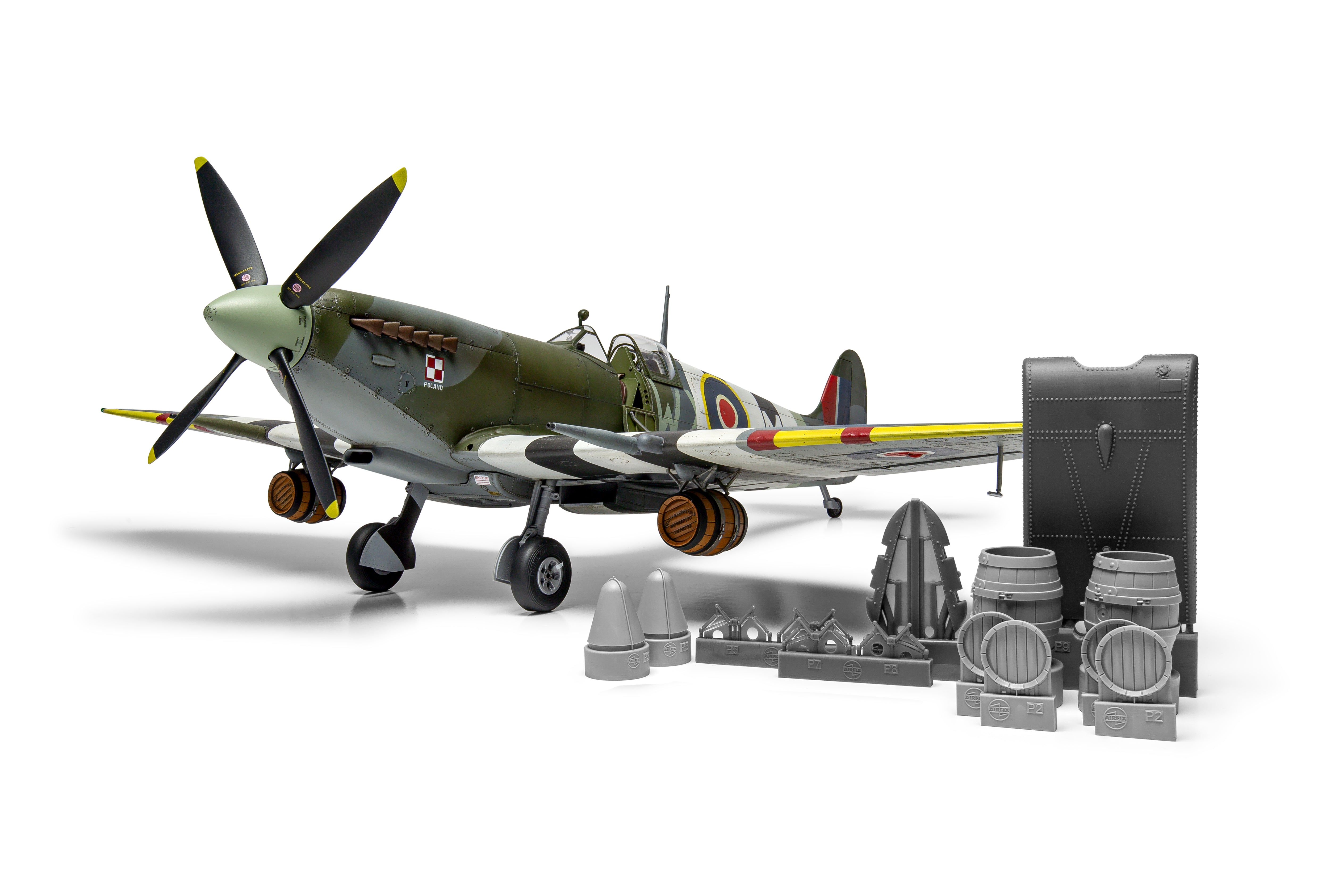 Model airplane with propellers and a camera on a white background