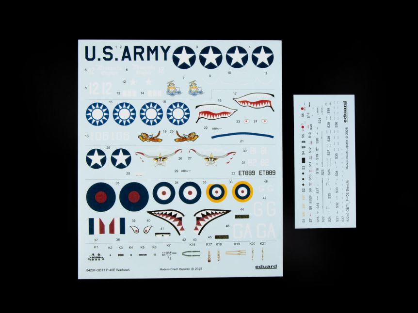 Sheet of U.S. Army and military-themed decals on a black background