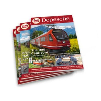 Magazine titled 'Depesche' with a red train on the cover, displayed on a white background.