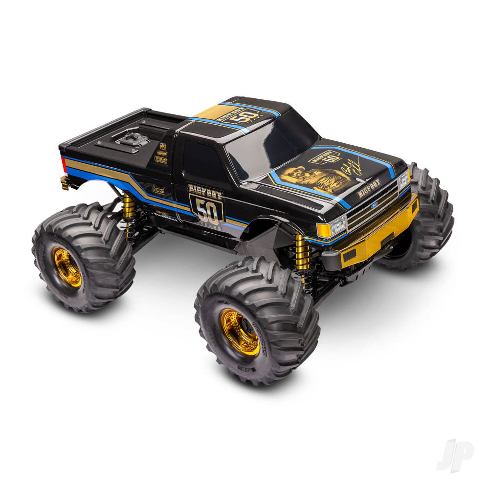 Monster truck model with large wheels and detailed design on a white background
