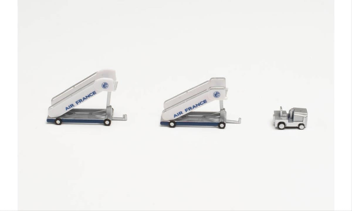 Herpa Wings Air France Historic Passenger Stairs (2) & Tractor (1:200) HA571876