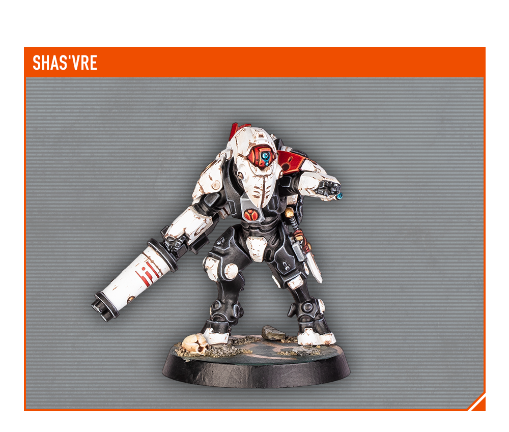 Toy figure of a robot with a red and white color scheme on a gray background