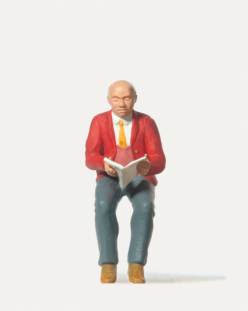Merten Man Reading Magazine Figure MRT0240001