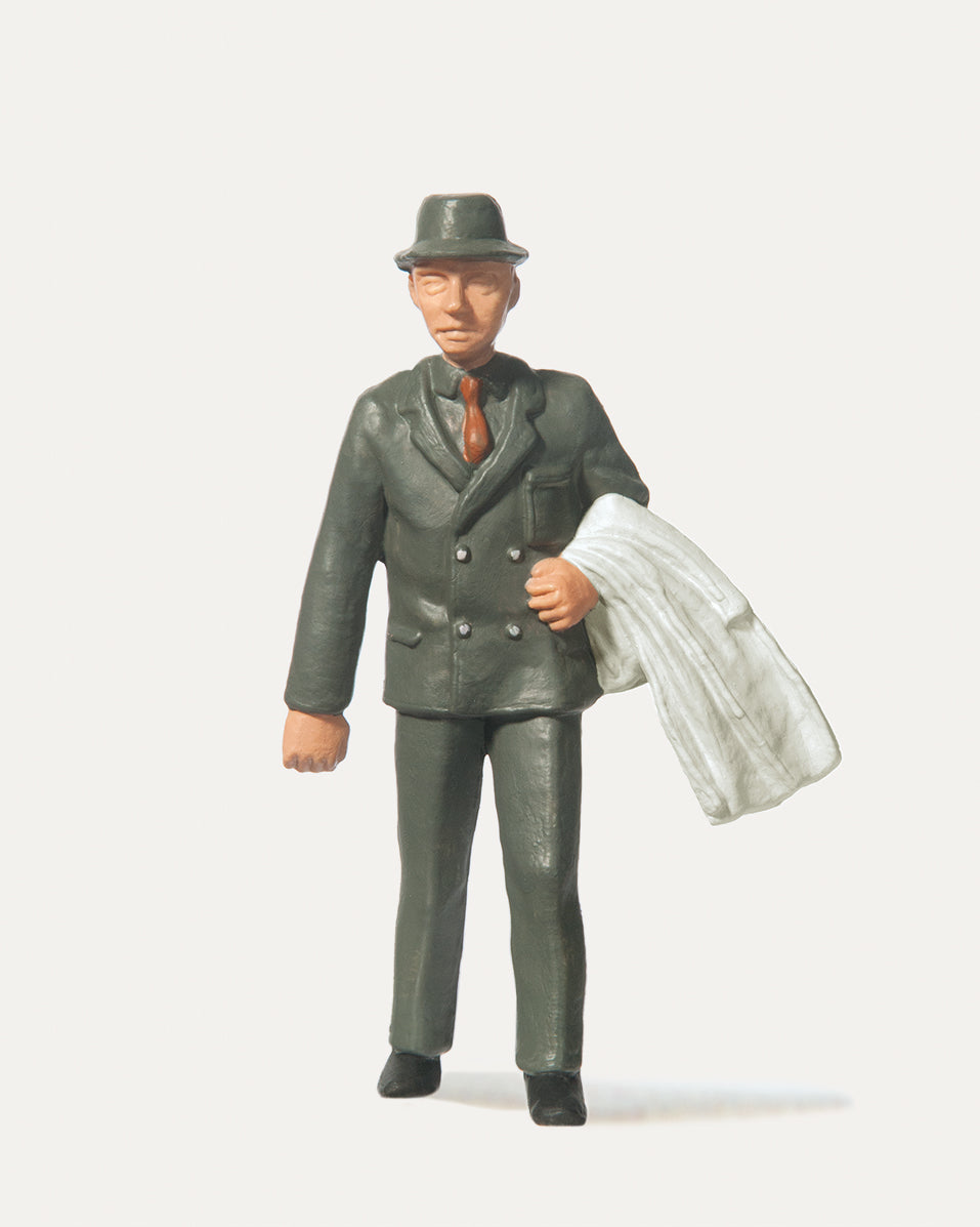 Merten Man in Suit Carrying Overcoat Figure MRT0240022