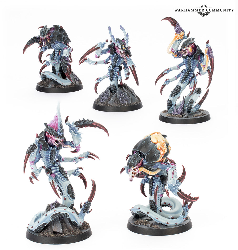 Five detailed miniature figurines on a white background, likely from the Warhammer Community collection.