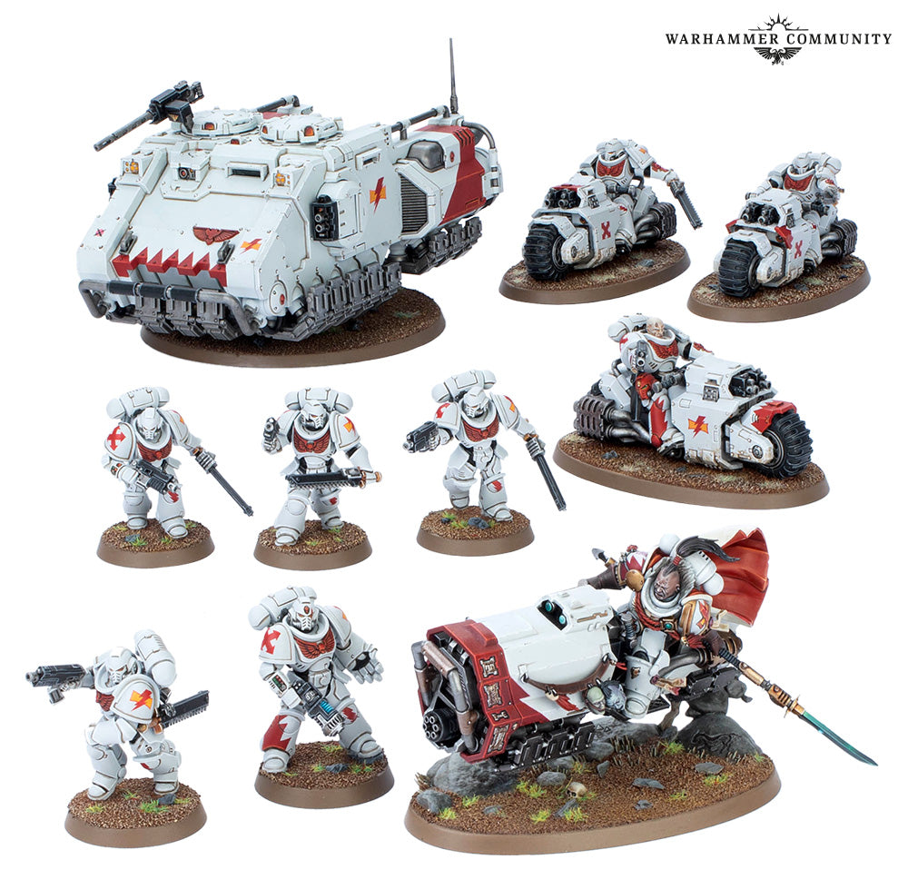 Collection of Warhammer figurines and vehicles on a white background