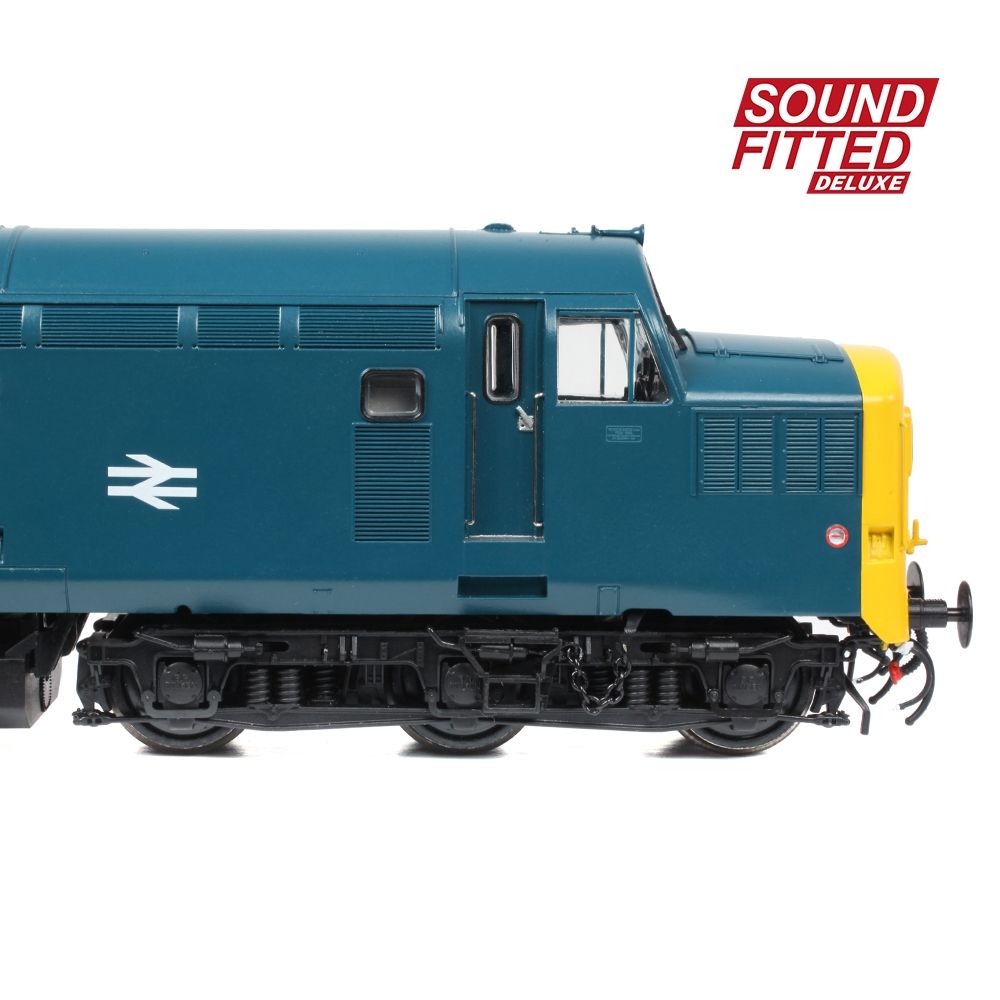 Model train with a blue body and yellow front, featuring a sound fitted deluxe label.