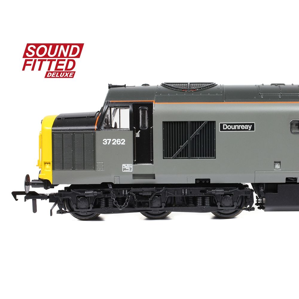 Model train with 'Sound Fitted Deluxe' label on a white background