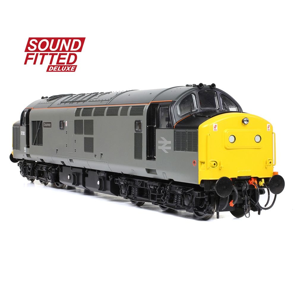 Model train with yellow front and gray body on a white background, featuring 'Sound Fitted Deluxe' text.