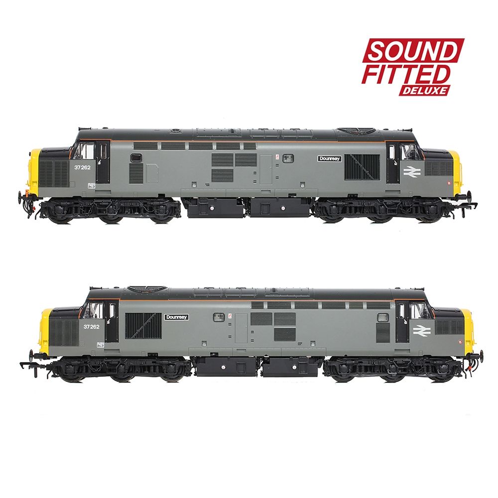 Two model trains with 'Sound Fitted Deluxe' label on a white background