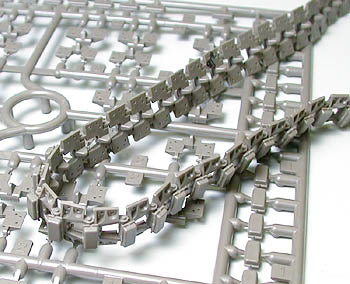 Tamiya German 18T Heavy Half Track model details including plastic parts and tracks on a sprue.