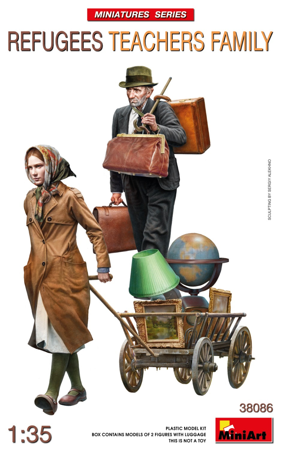 REFUGEES TEACHERS FAMILYBOX CONTAINS MODELS OF 2 FIGURES WITH LUGGAGE