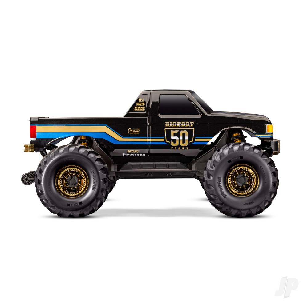 Toy monster truck with large wheels on a white background