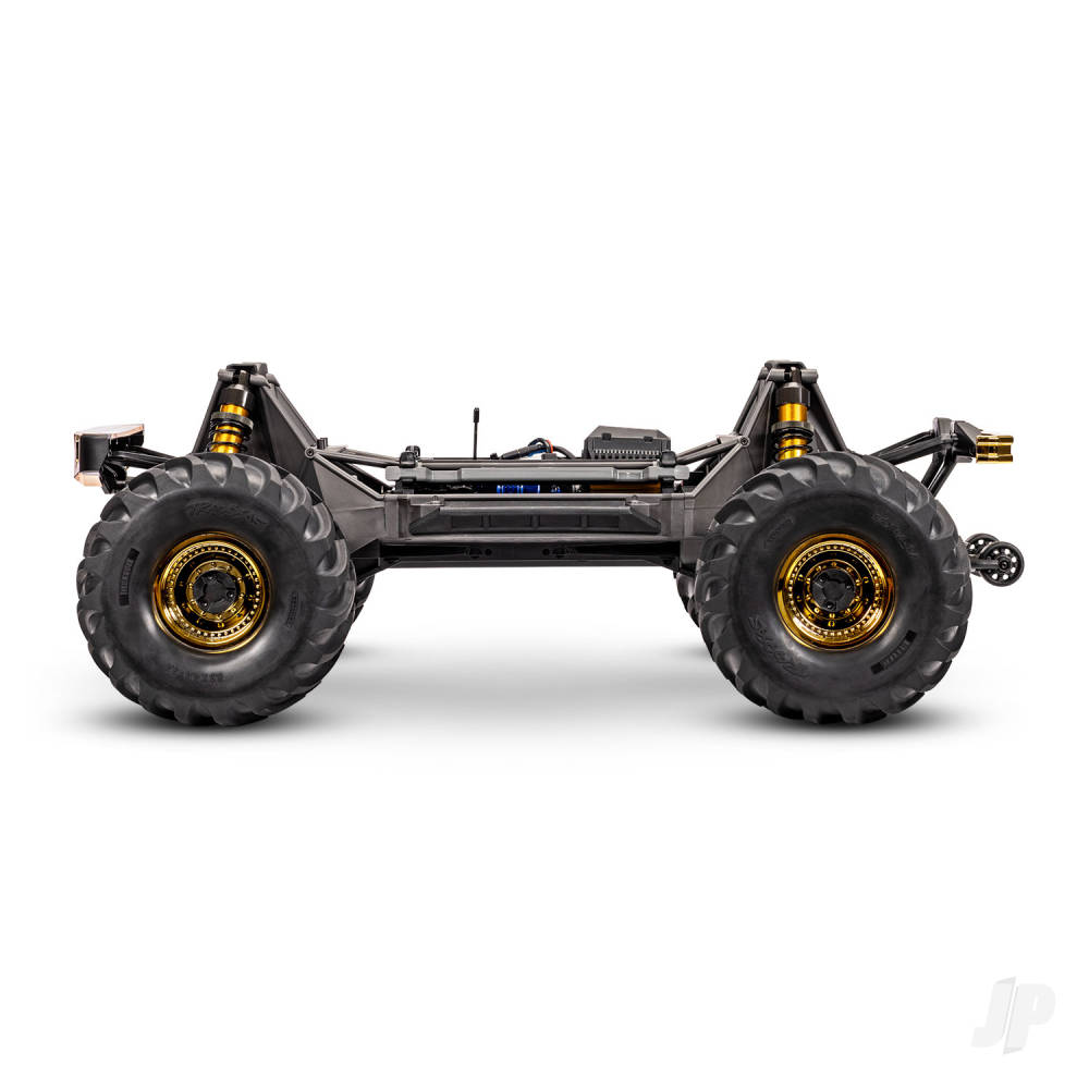 Monster truck chassis with large wheels on a white background
