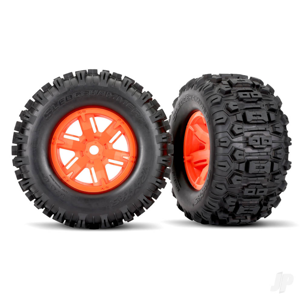 Traxxas Tyres &amp; wheels, assembled, glued (X-Maxx orange wheels, Sledgehamm - TRX7774T Main