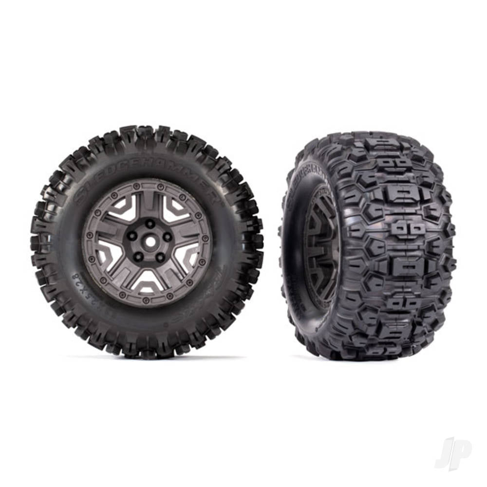 Traxxas Tyres & wheels, assembled, glued (charcoal gray 2.8" wheels, Sledgehammer Tyres, foam inserts) (2) (TSM rated) TRX9072-GRAY