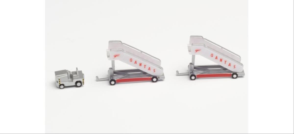Herpa Wings Qantas Historic Passenger Stairs (2) with Tractor (1:200) HA571005