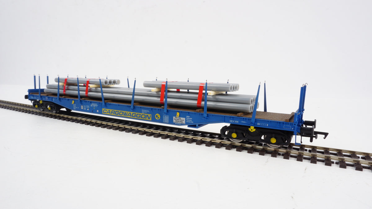 Heljan Cargowaggon IGA Bogie Flat Blue w/Pipe Load Weathered HN5113