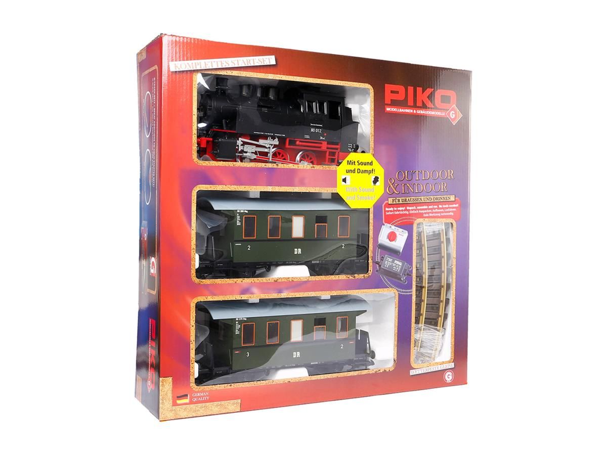 Piko toy train set packaging with three train models displayed.