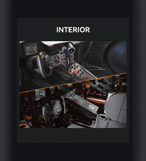 Interior view of the CaDa Mercedes-AMG GT3 model cockpit showcasing the steering wheel and controls.