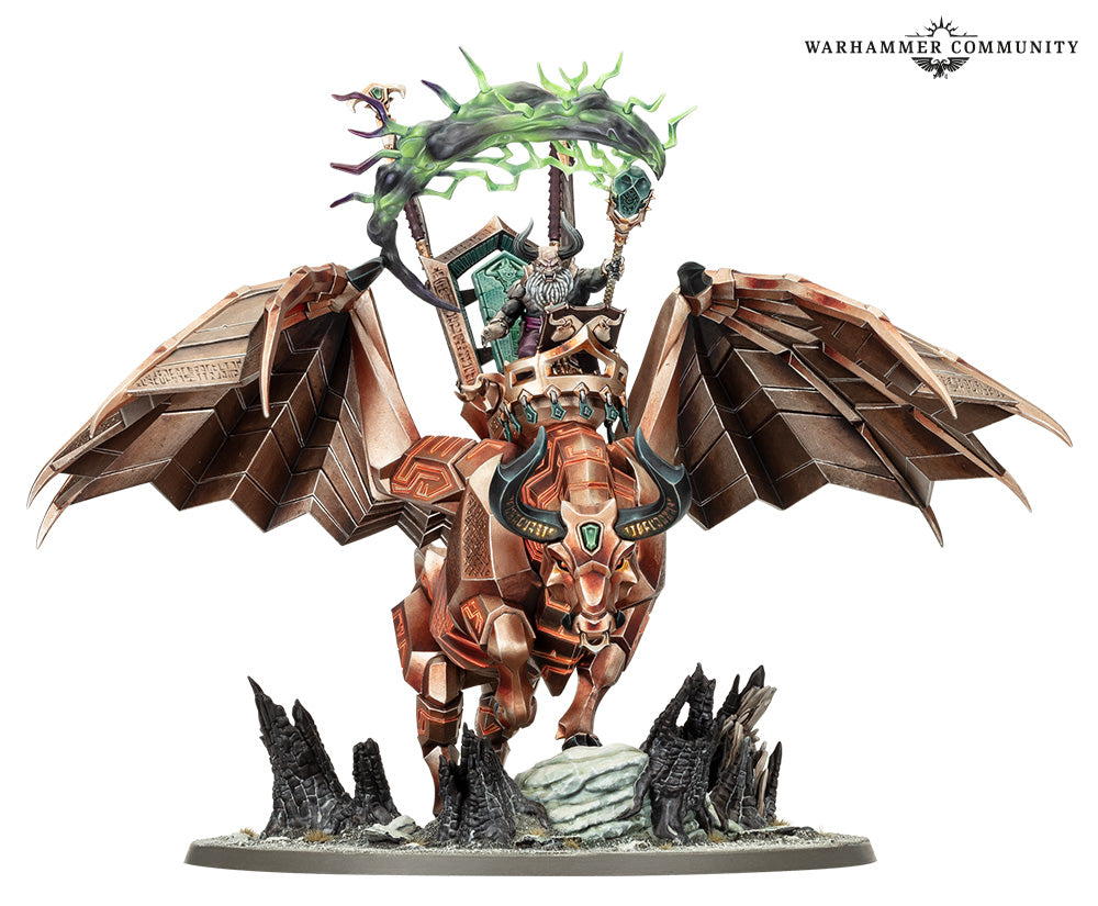 Warhammer figurine of a warrior on a dragon with a white background