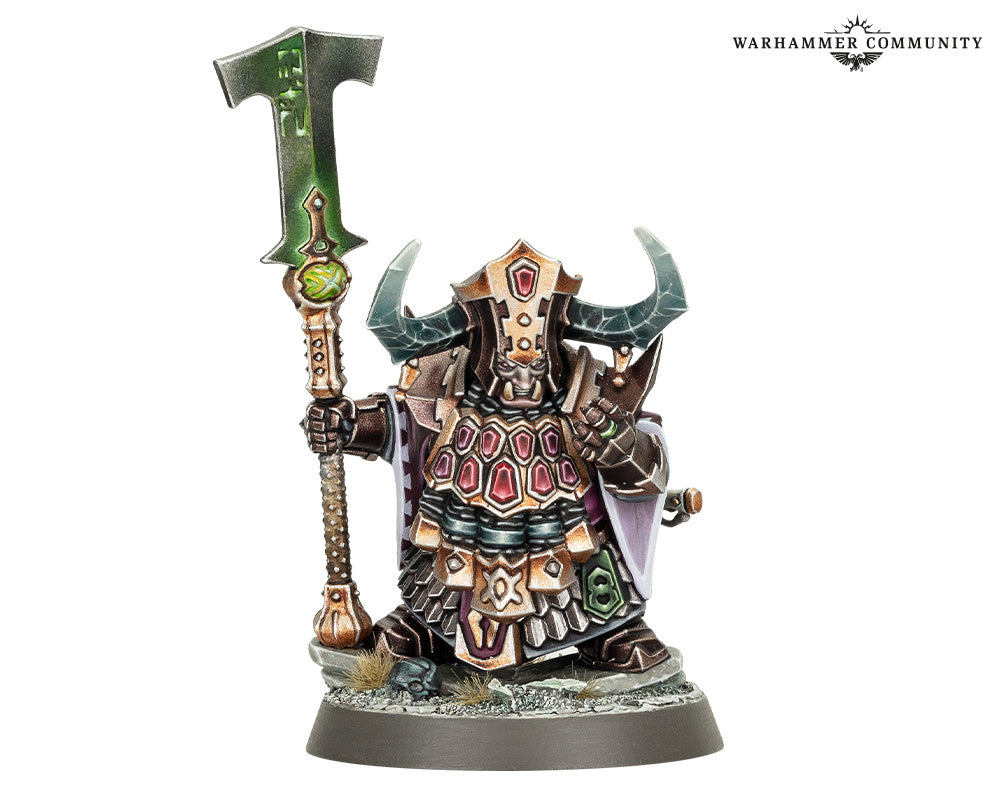 Warhammer figurine with ornate armor and weapon on a white background
