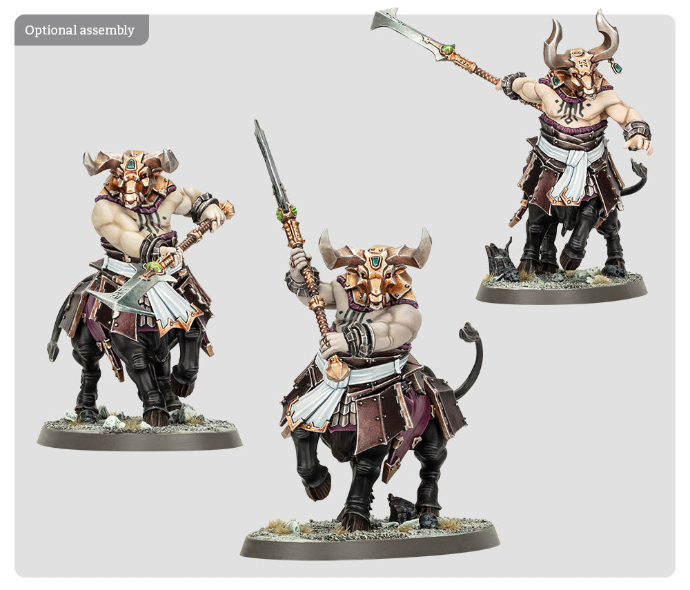 Three fantasy miniatures of armored figures with weapons on a white background