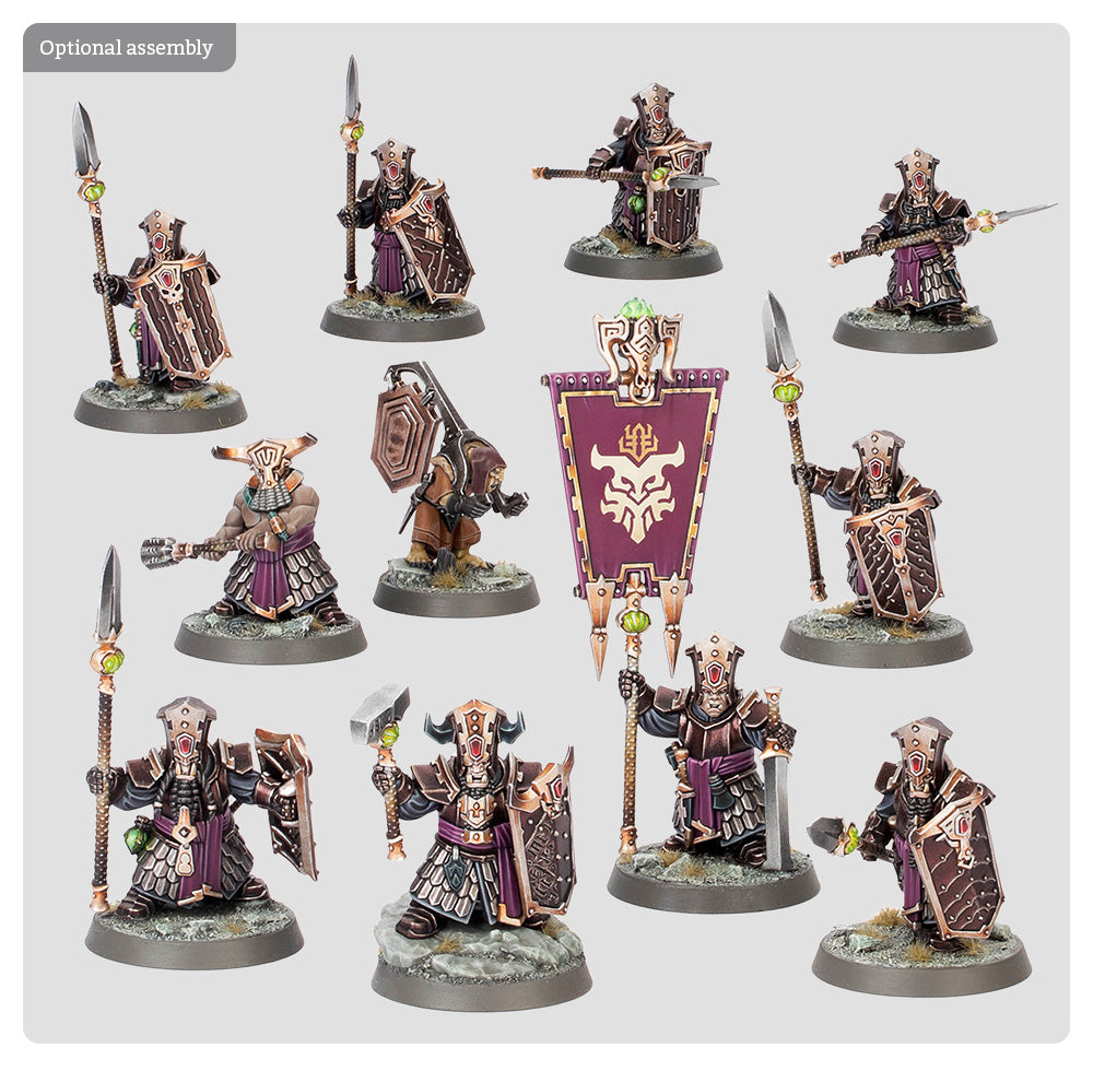 Set of miniature figurines with detailed armor and weapons on a white background