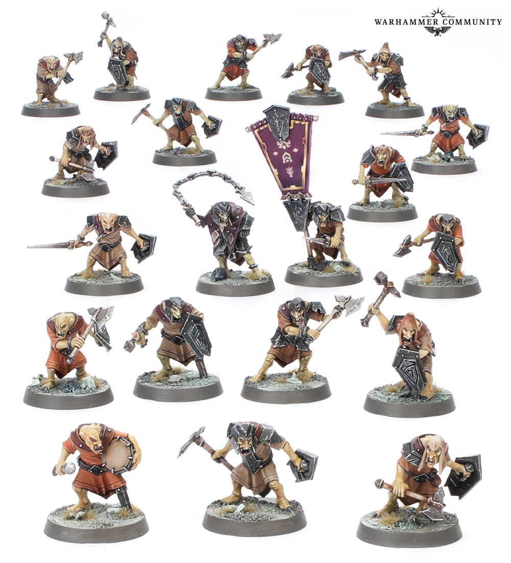 Collection of miniature figurines on a white background with 'Warhammer Community' logo.