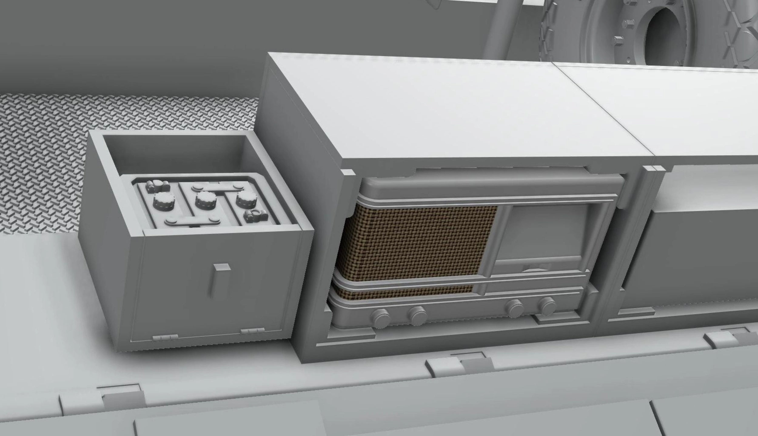 Close-up of a vintage-style radio and speaker on a textured surface